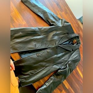 Vintage Danier leather blazer . Not too boxy and not too fitted . Lovely !